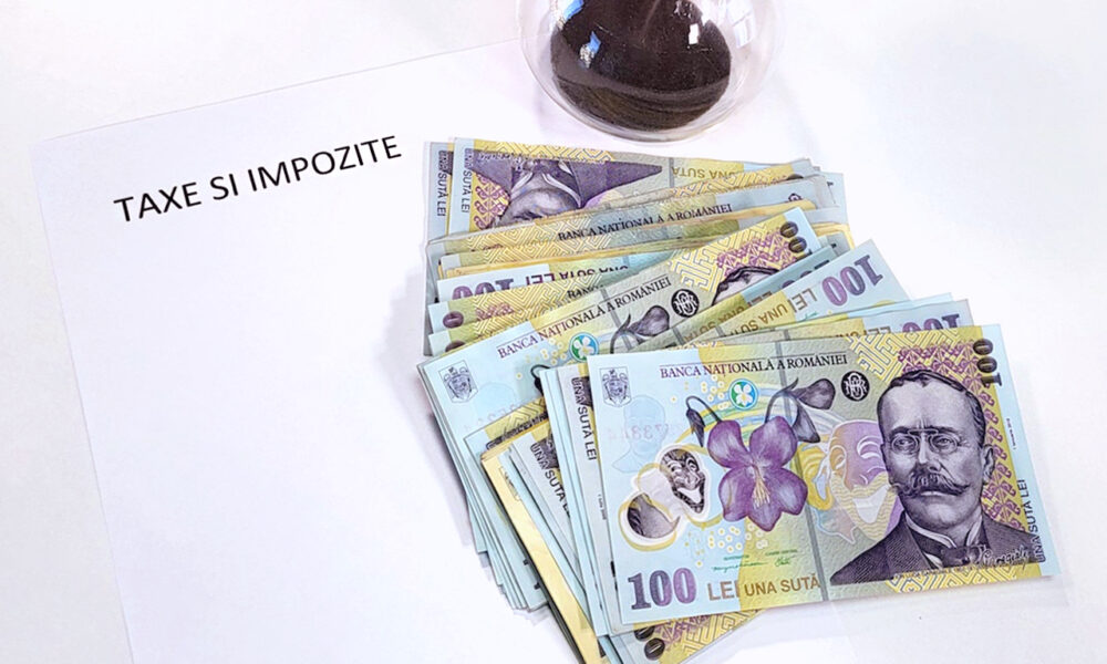 Românii vor avea parte de taxe noi în 2023! Câți bani trebuie să scoatem în plus din buzunar