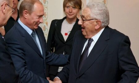 Vladimir Putin si Henry Kissinger