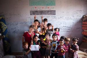 Copii sirieni la școală în Atmeh, Siria, Sursa foto: dreamstime.com
