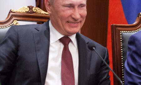 Vladimir Putin râde; sursă foto: capital.ro