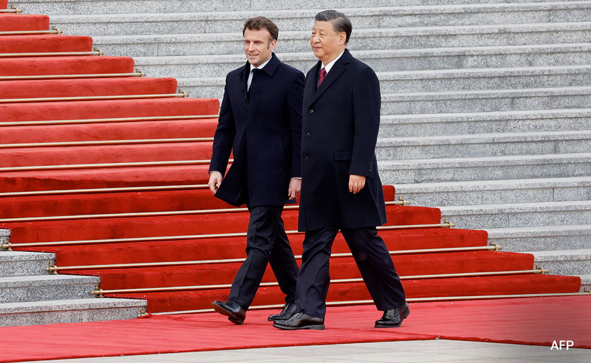 Emmanuel Macron, președintele Franței, și Xi Jinping, președintele Chinei (sursă foto: ndtv.com)