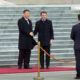 Emmanuel Macron alături de Xi Jinping în timpul vizitei din China