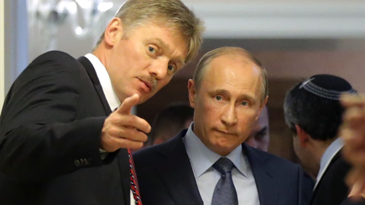 Peskov și Putin; sursă foto: cnn.com