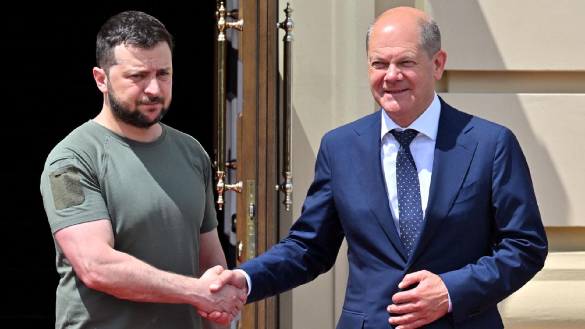 Olaf Scholz și Volodimir Zelenski; sursă foto: realitatea.net